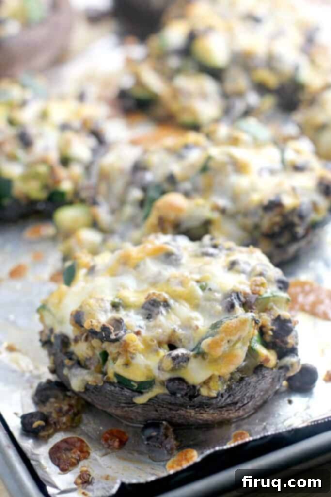 Sunrise Ranchero Kick 11 cooked, cheesy stuffed mushrooms on the bake sheet