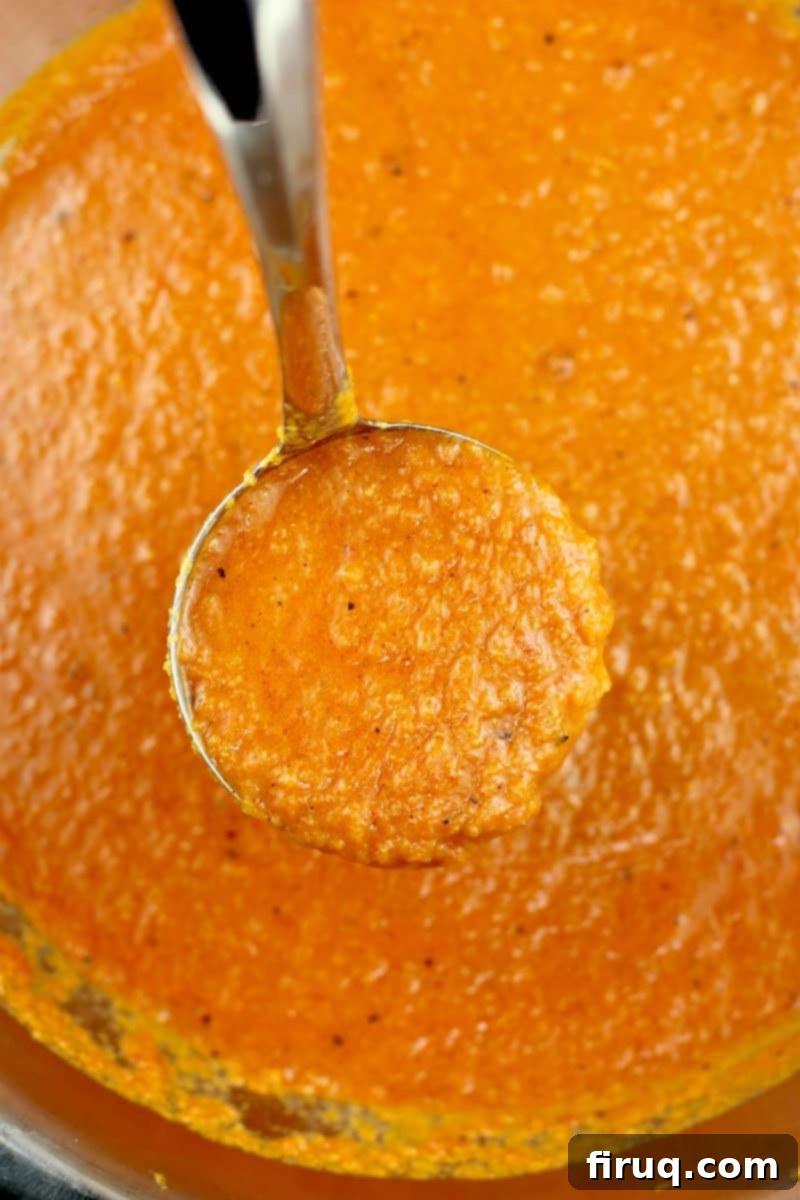 Sunrise Ranchero Kick 13 ladle scooping sauce in saucepan