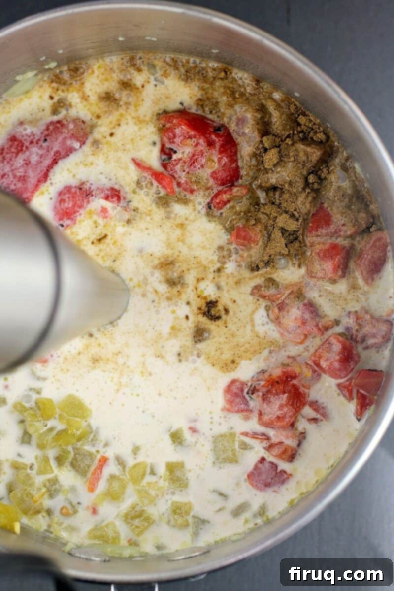 Sunrise Ranchero Kick 6 immersion blender mixing ingredients together