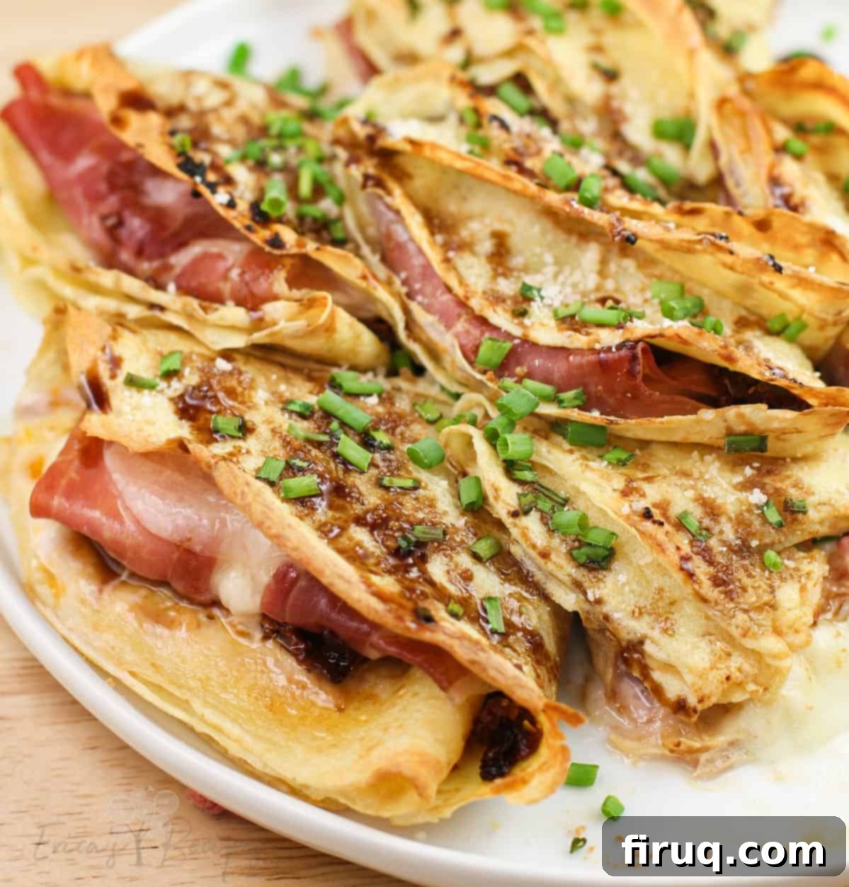 Prosciutto and Cheese Crepes 12 close view of prepared crepes showing prosciutto and melted cheese