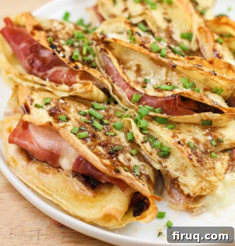 Prosciutto and Cheese Crepes 4 close view of prepared crepes showing prosciutto and melted cheese