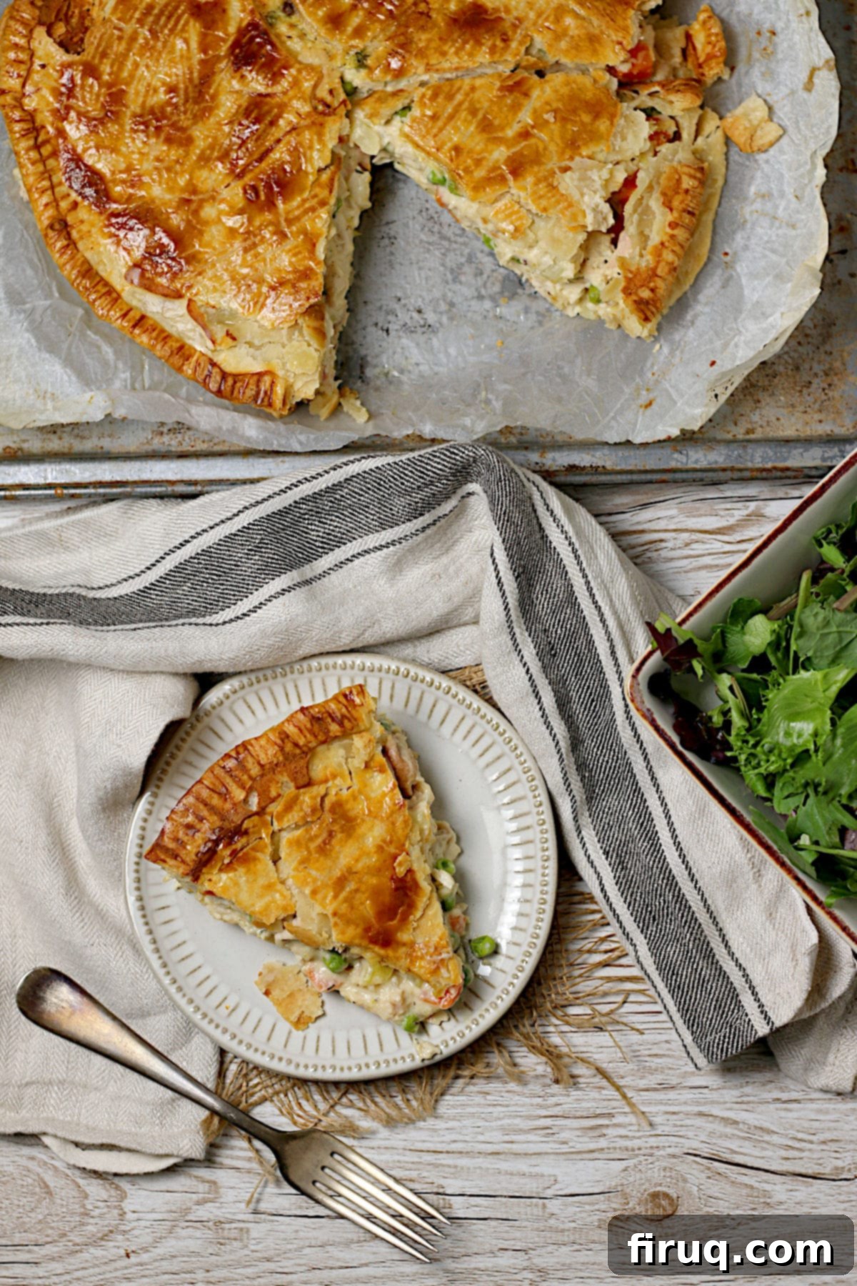 Overhead View of Chicken Pot Pie An overhead photo of a freshly baked homemade Weeknight Chicken Pot Pie, highlighting its golden crust and comforting appeal.