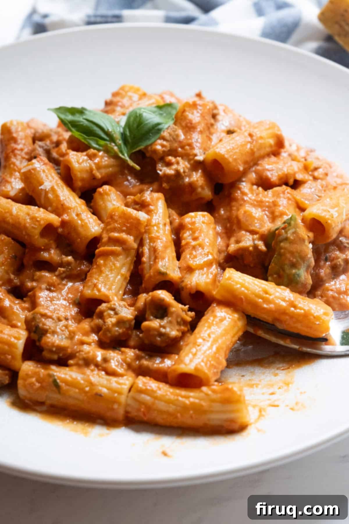 Rosé Sausage Pasta 11 italian pink sauce with sausage served with rigatoni and topped with parmesan and basil