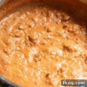 Rosé Sausage Pasta 12 Italian pink sauce with sausage in sauce pot