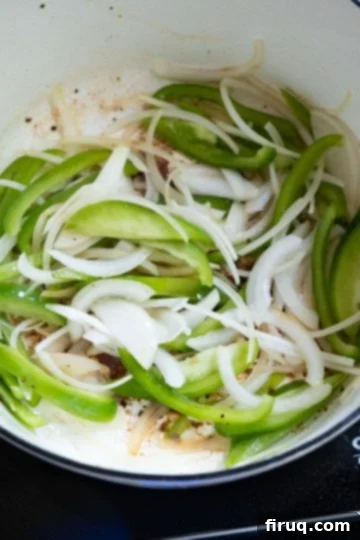 Zesty Italian Chicken Scarpariello 6 sauteing onions and peppers