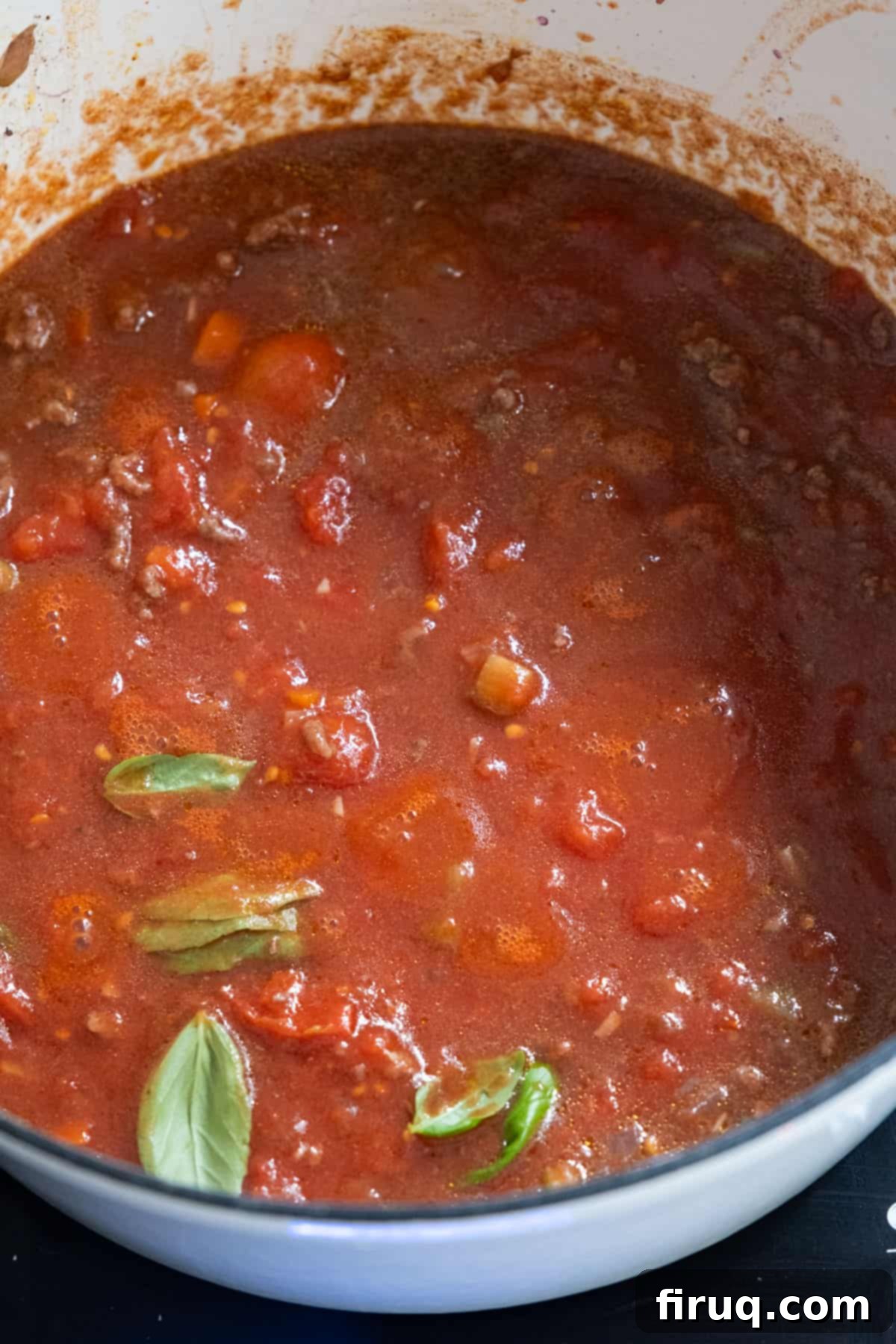 Classic Italian Stuffed Peppers in Tomato Sauce 8 Crushed whole tomatoes added to the sauce base after ground beef has been removed