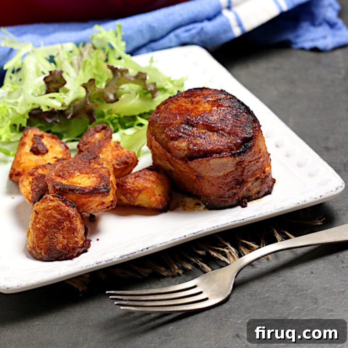 Recipe Card Image for Smoky Bacon Wrapped Pork Medallions Smoky Bacon Wrapped Pork Medallions ready to serve.