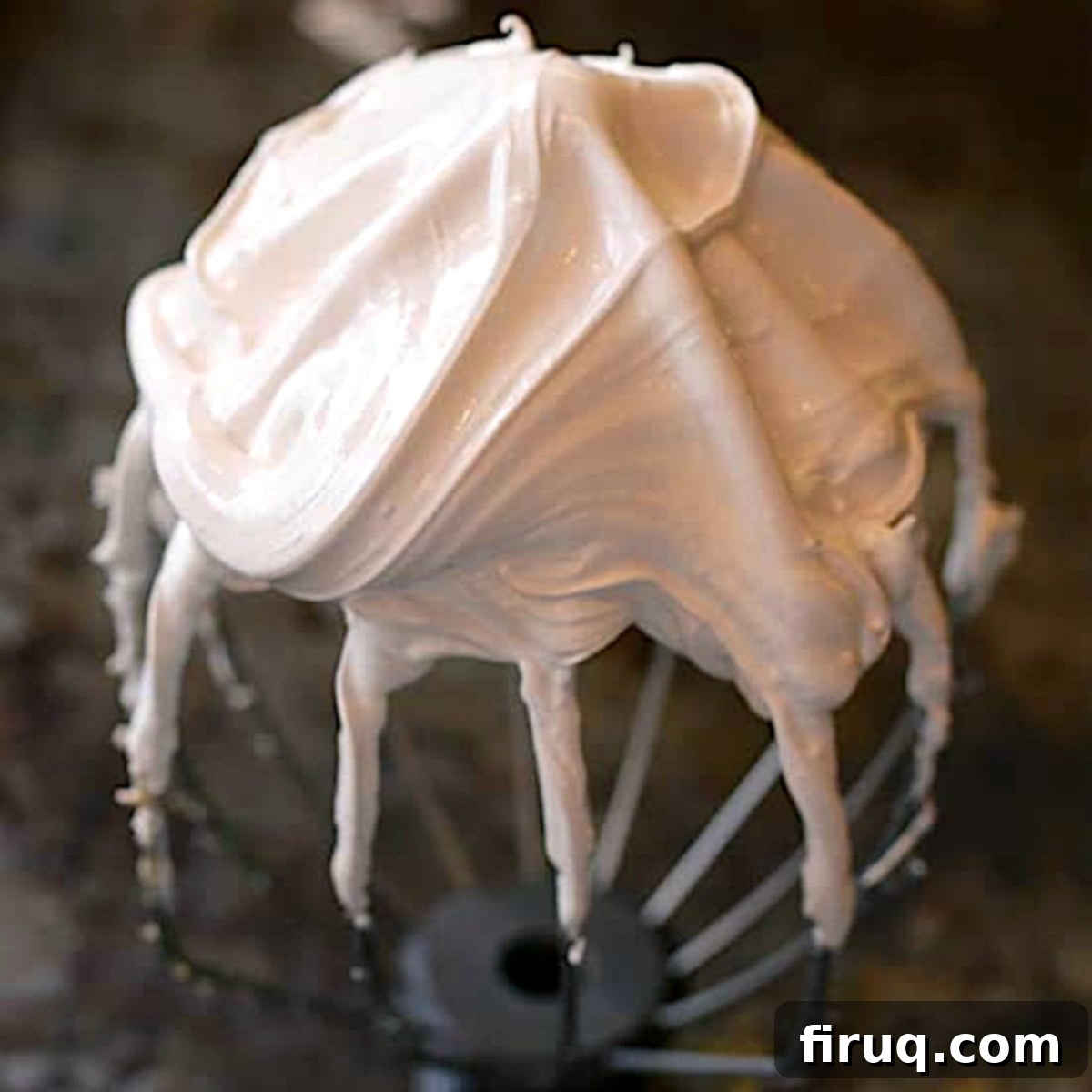 Homemade Marshmallow Creme Overview A bowl of homemade marshmallow creme with a whisk