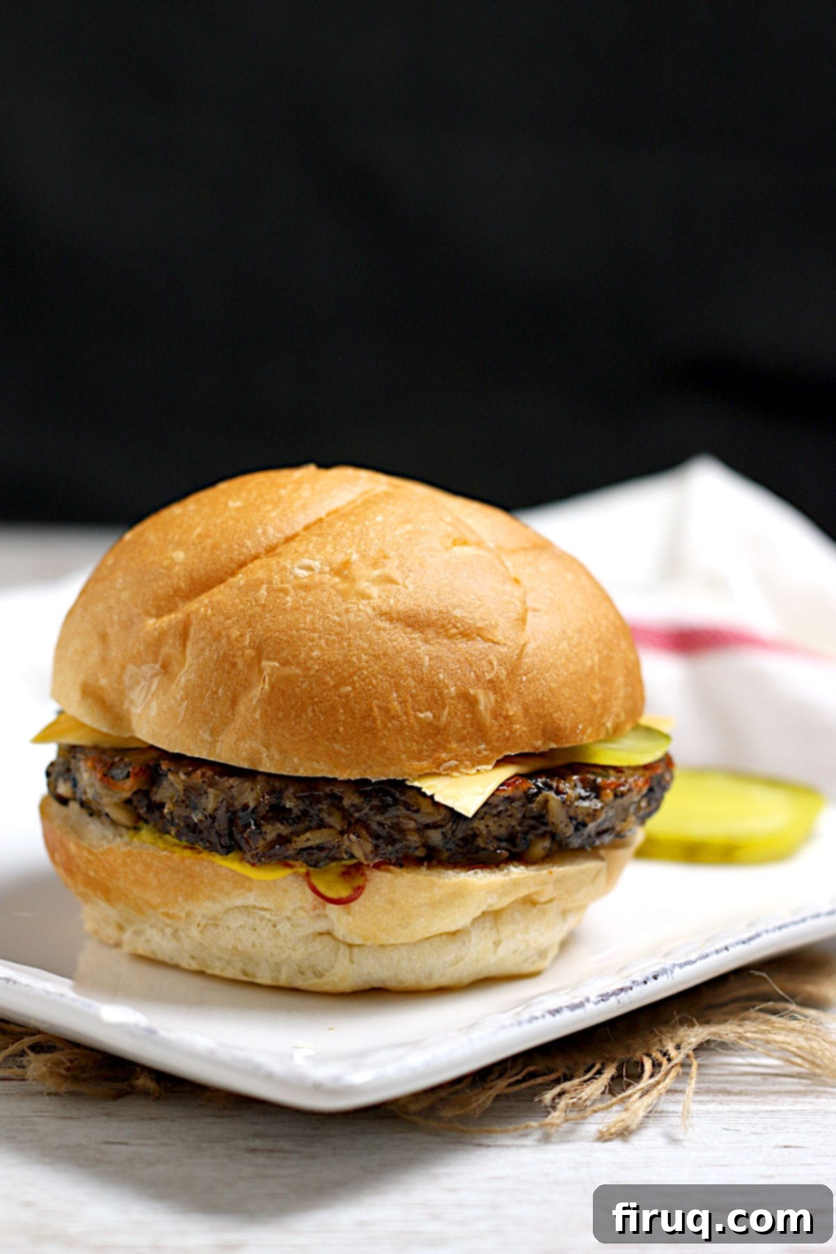 Perfectly cooked Mushroom Grain Veggie Burger A finished Mushroom Grain Veggie Burger, beautifully browned and crisp, ready to be enjoyed.
