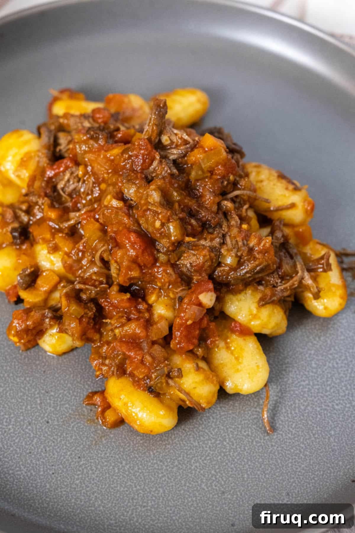 Braised Italian Short Ribs with Gnocchi 11 Italian short ribs and ragu served over gnocchi, garnished with fresh herbs
