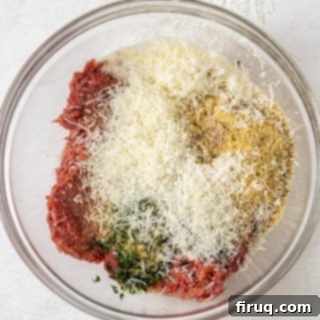 Classic Italian Wedding Soup 3 Italian meatball mix in a bowl, ready to be rolled