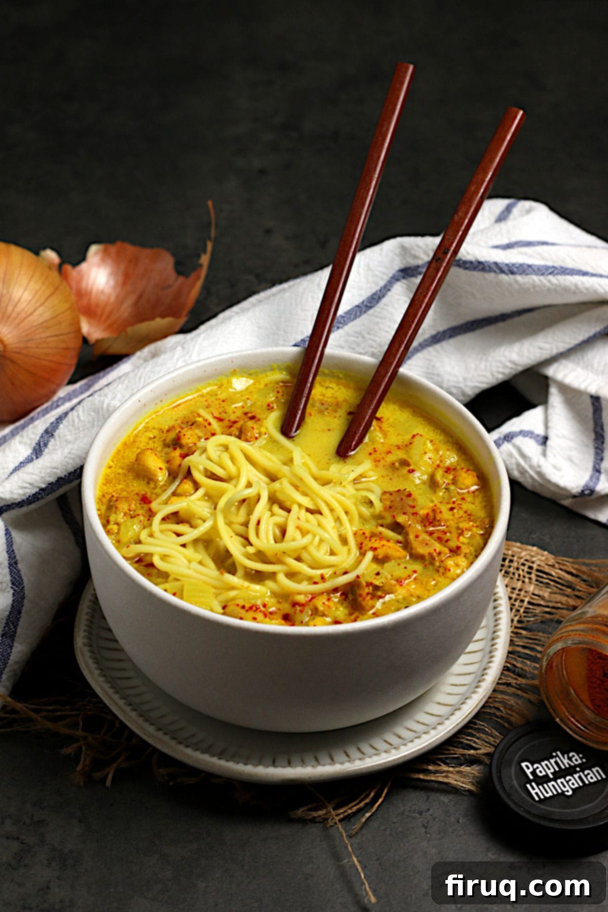 Golden Crispy Oven Baked Chicken Fingers 4 Burmese Coconut Chicken Noodle Soup in a white bowl.