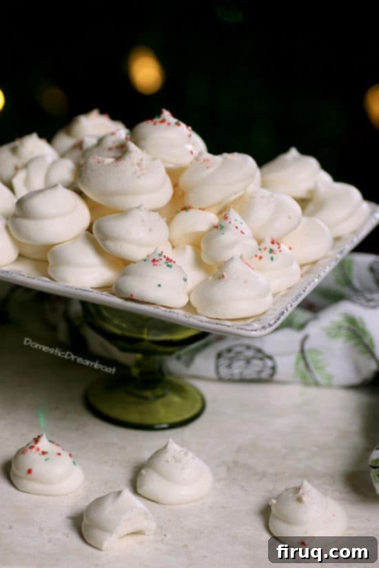 Vegan Meringue Cookies Vegan Meringue Cookies on a white platter.