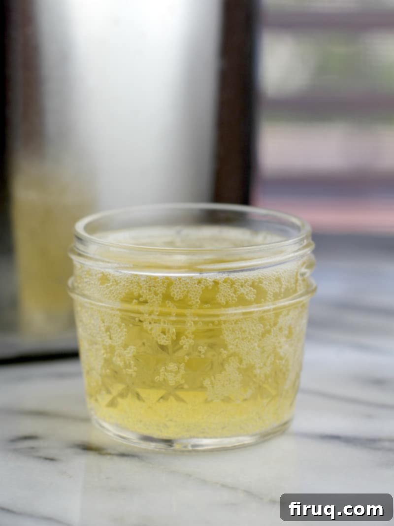 Irresistible Velveeta Rotel Sausage Dip 5 Small mason jar with beer