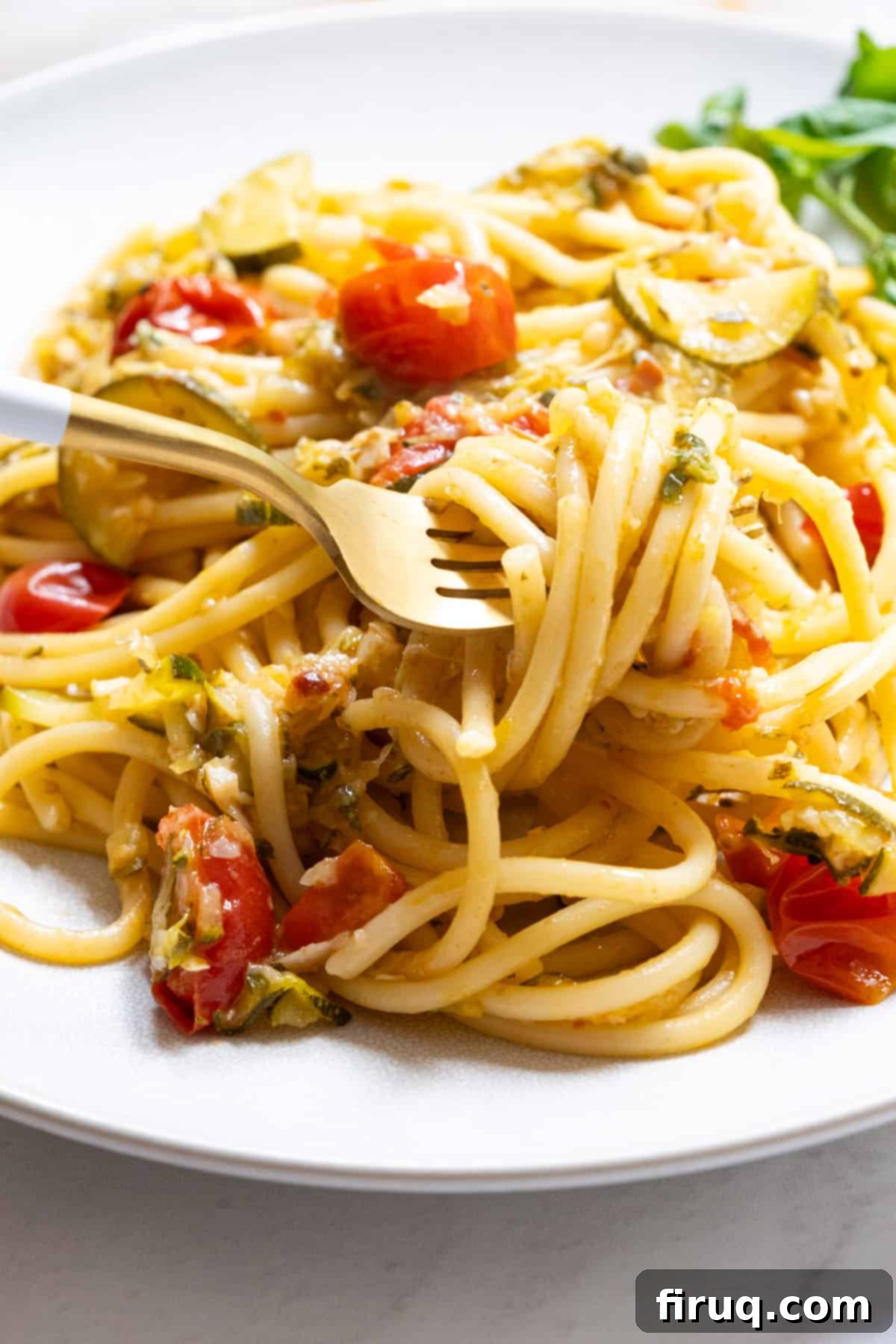 Sun-Kissed Zucchini Pasta 2 A fork lifting a swirl of creamy Italian summer pasta with zucchini and cherry tomatoes. A perfect illustration of a light, healthy, and delicious summer meal.