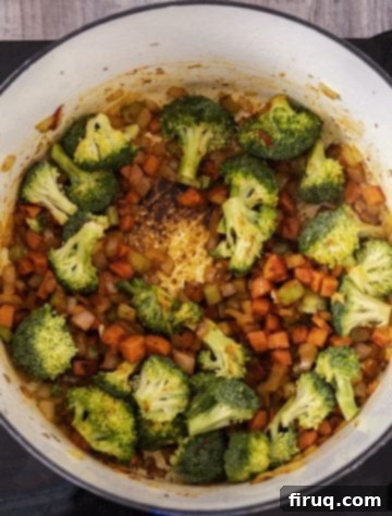 Hearty Italian Sausage and Tortellini Soup 7 adding broccoli to slightly steam