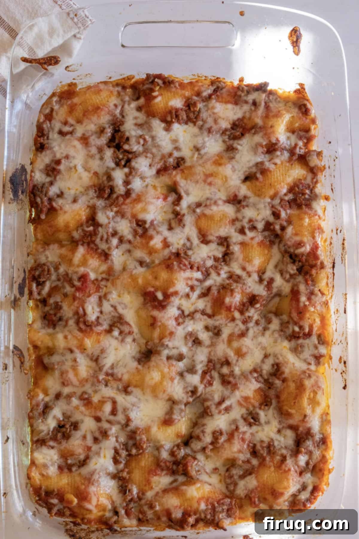 Hearty Stuffed Shells with Bolognese and Ricotta 12 stuffed shells after being baked in the oven