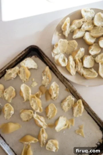 Hearty Stuffed Shells with Bolognese and Ricotta 9 stuffing the shells with ricotta