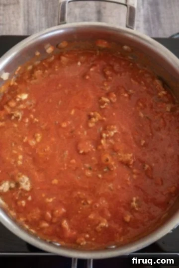 Homestyle Italian Baked Ziti 6 red sauce added to sausage and onions