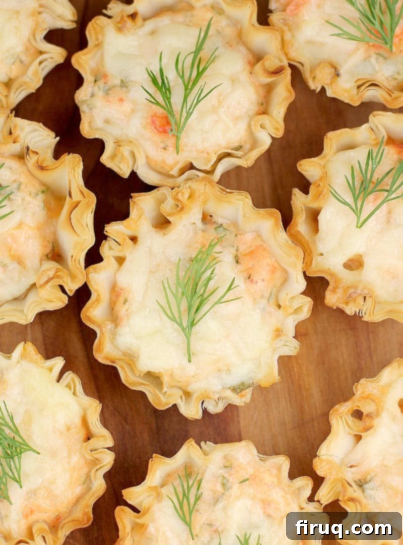 Exquisite Smoked Salmon Tartlets 9 top down view of a mini smoked salmon tart with dill garnish