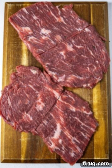 Slow-Simmered Italian Braciole Perfection 4 Thinly sliced flank steaks laid flat