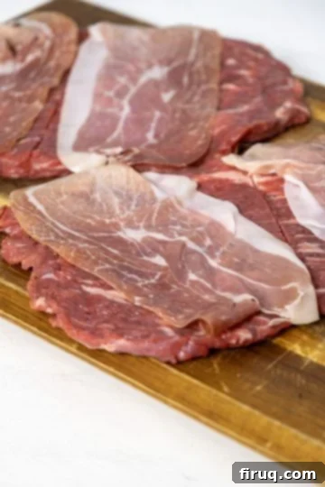 Slow-Simmered Italian Braciole Perfection 5 Flank steaks topped with slices of prosciutto