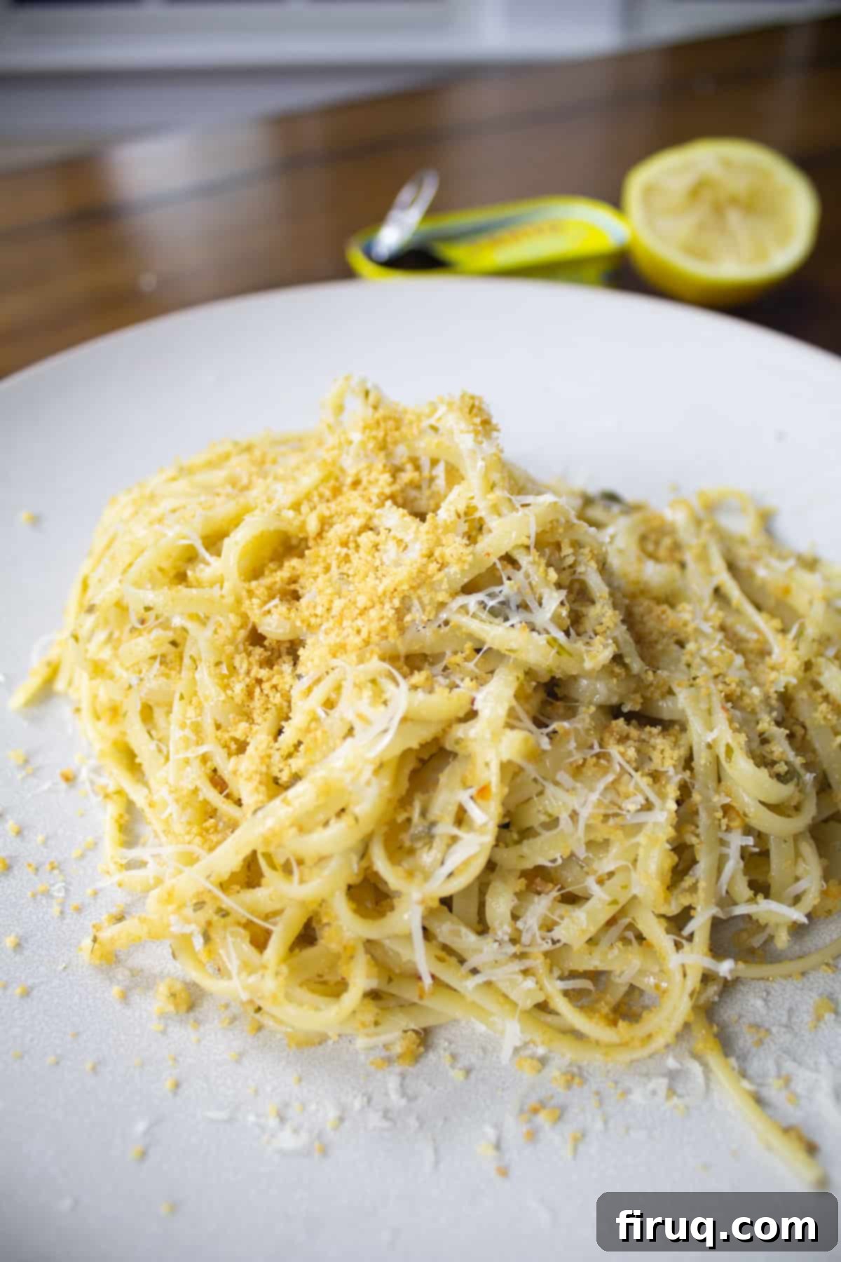 Crispy Breadcrumb Anchovy Garlic Pasta 5 Close up of lemon garlic anchovy linguine with toasted bread crumbs, ready to eat