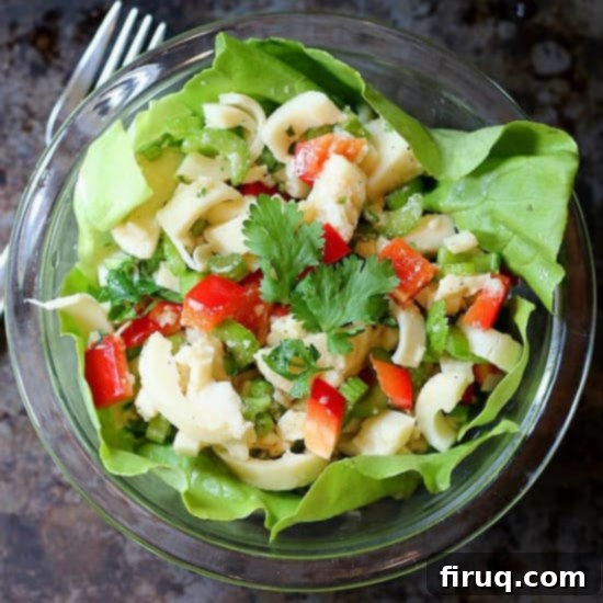 Pura Vida Palm Salad 2 Heart of Palm Salad in a glass bowl.