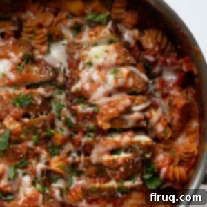 Dreamy Creamy Chicken Parmesan Pasta 10 creamy chicken parmesan pasta in a skillet