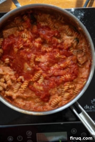 Dreamy Creamy Chicken Parmesan Pasta 7 pasta added to sauce