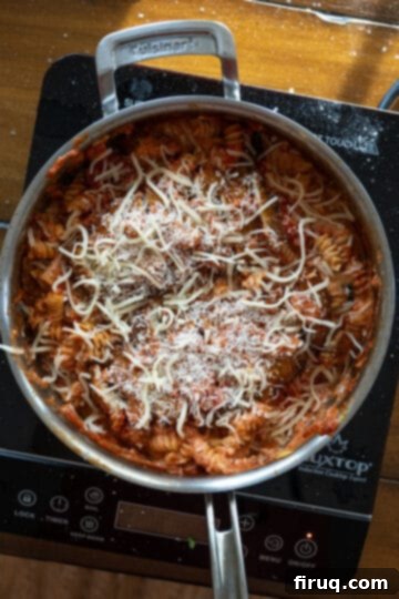 Dreamy Creamy Chicken Parmesan Pasta 8 cheese on pasta before baking