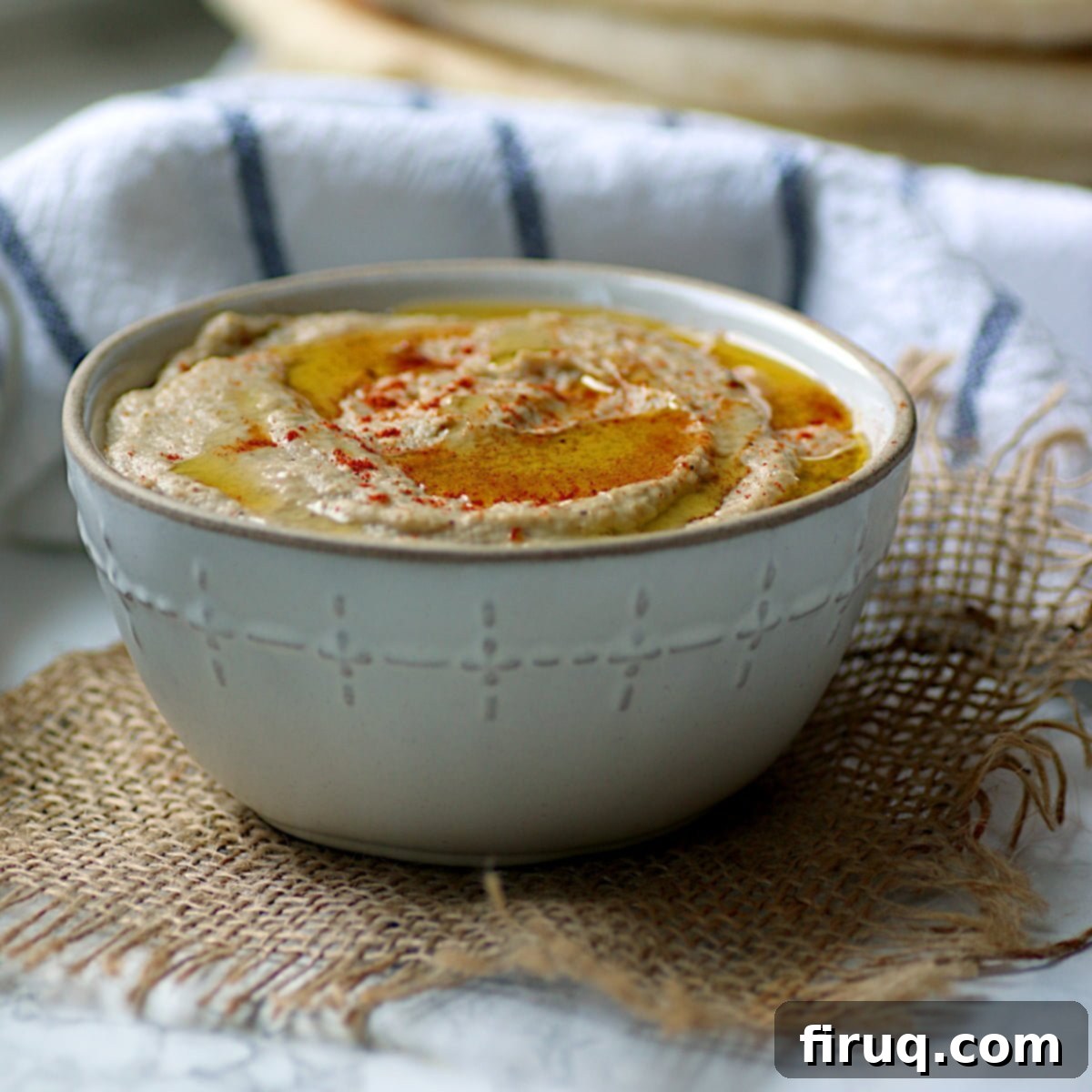 Baba Ghanouj Dip Homemade baba ghanouj in a white bowl.