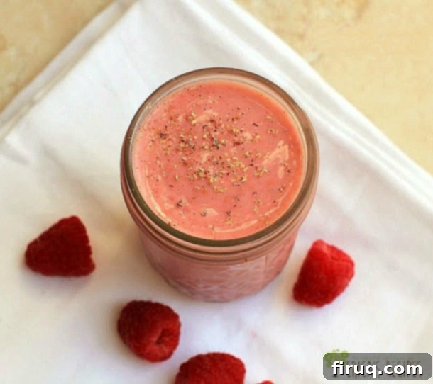 Raspberry Vanilla Chai Smoothie, a vibrant and healthy drink.