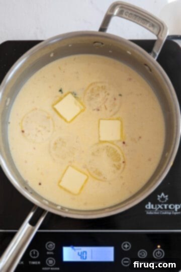 Zesty Lemon Butter Chicken 7 butter added to the creamy lemon sauce