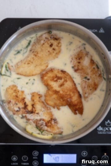 Zesty Lemon Butter Chicken 8 Chicken simmering in lemon butter sauce