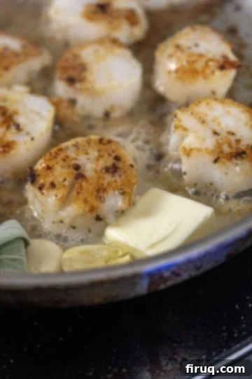Sizzling Garlic Sage Scallops 7 basting scallops in butter with fresh sage and crushed garlic