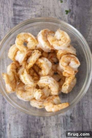 Zesty Homemade Shrimp Cocktail Perfection 6 Chilled shrimp seasoned with Old Bay, ready for serving