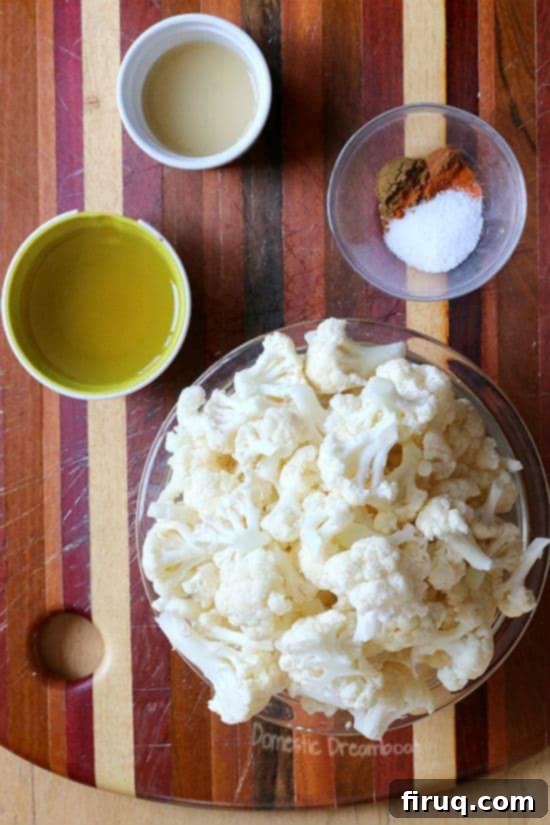 Simple Ingredients for Flavorful Cauliflower The ingredients to make Crispy Roasted Cauliflower - cauliflower florets, olive oil, kosher salt, cumin, black pepper, cinnamon, cayenne, lemon juice.