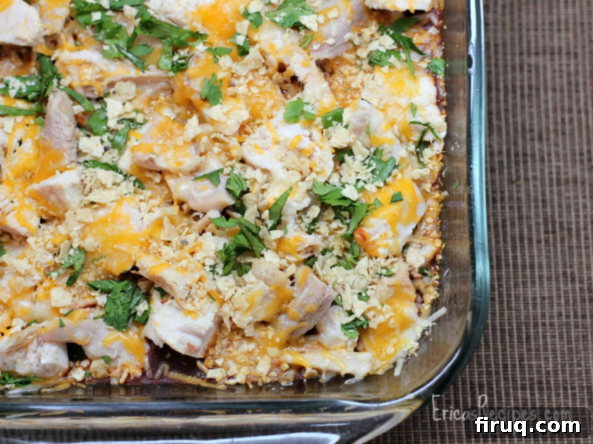 Fiesta Turkey Tamale Bake 2 A top-down view of the golden-brown Turkey Tamale Casserole in a square baking dish