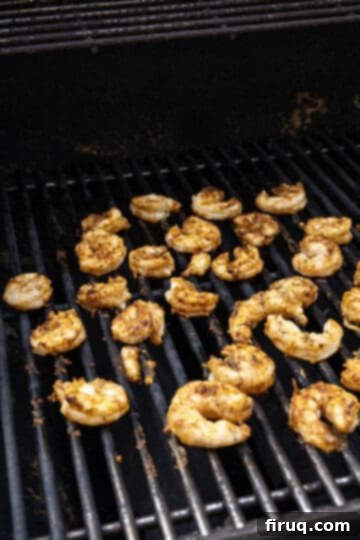 Zesty Mango-Lime Grilled Shrimp Salad 6 Shrimp grilling on a barbecue.