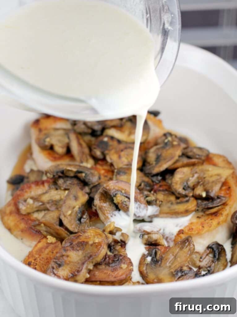 Hearty Pork Chop and Cornbread Bake 9 because this is a recipe for easy meal prep, this photo shows the quick sour cream sauce being poured over the mushrooms and seared chops