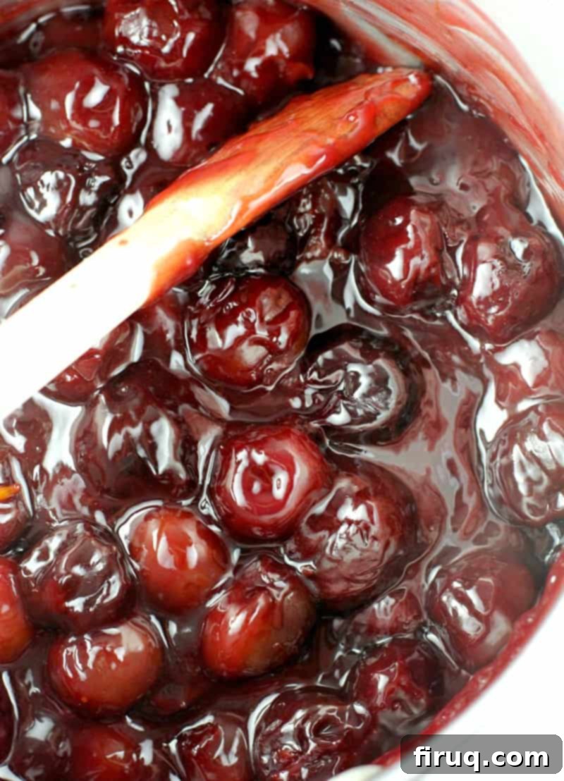 Velvet Cherry Cookie Tarts 6 the black cheer pie filling glistening in a saucepan, stirred with a wooden spoon