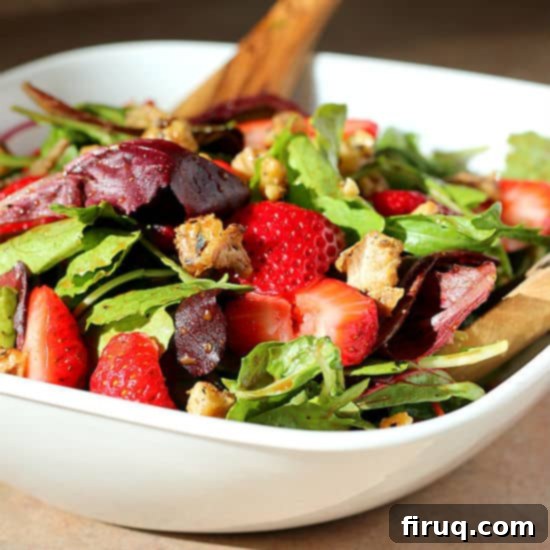 Gourmet Strawberry Walnut Salad with Rosemary Infused Balsamic 2 Overhead shot of Strawberry Salad with Candied Walnuts and Rosemary Balsamic Vinaigrette