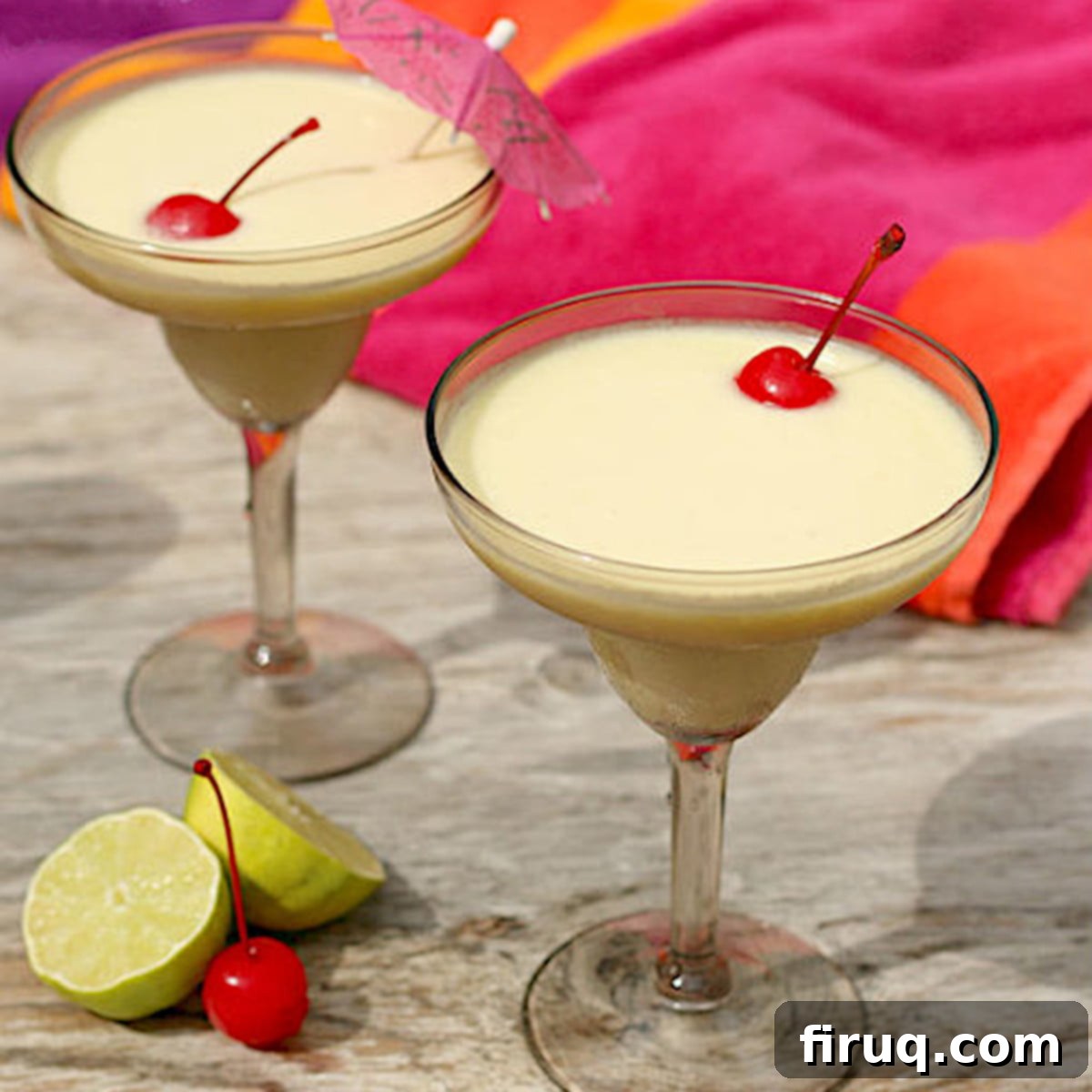 Refreshing Piña Colada A refreshing glass of homemade No Syrup Piña Colada, garnished with a lime slice, perfect for summer.
