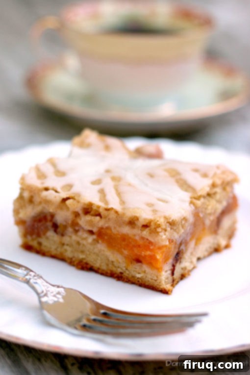Ready to Serve Peach Pie Bars Tray of Peach Pie Bars with some slices removed