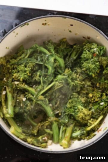 Vibrant Garlic Rapini 7 sauteed and steamed broccoli rabe cooked in a dutch oven