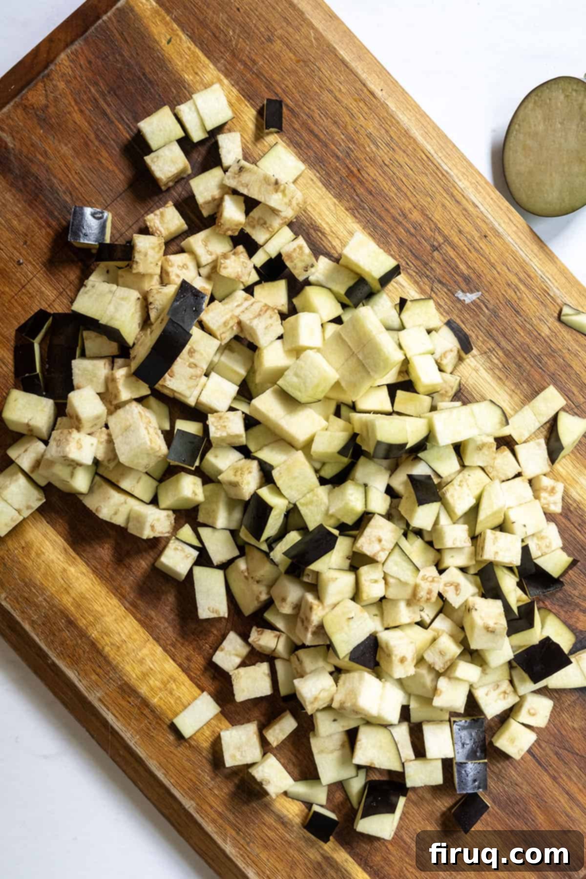 Tangy Eggplant Caponata 4 Finely diced eggplant, salted and ready for cooking, a key step in making authentic Caponata.