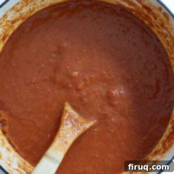 Grandma's Traditional Sunday Gravy 11 Sunday sauce in a pot.
