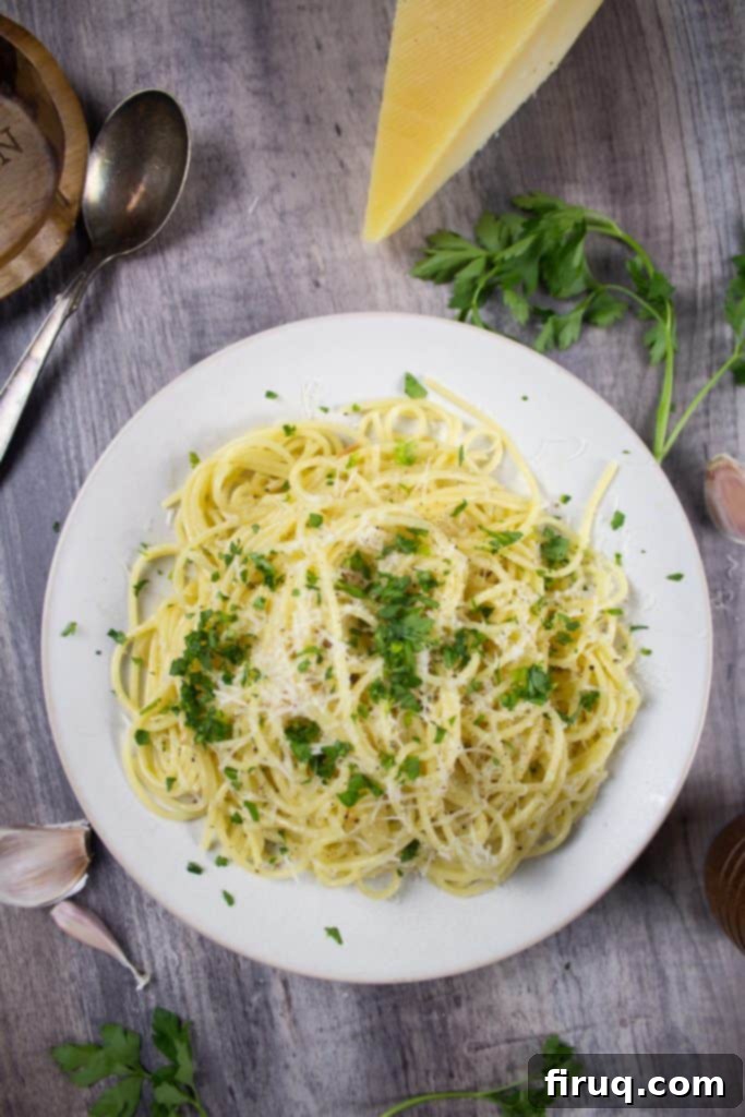 Classic Italian Dishes You Need to Master 5 spaghetti with garlic and oil with garlic cloves, parsley and parmesan in frame