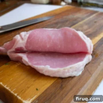 The Ultimate Grilled Stuffed Pork Chops 6 A thick bone-in pork chop expertly butterflied, ready to be pounded and then stuffed with filling.